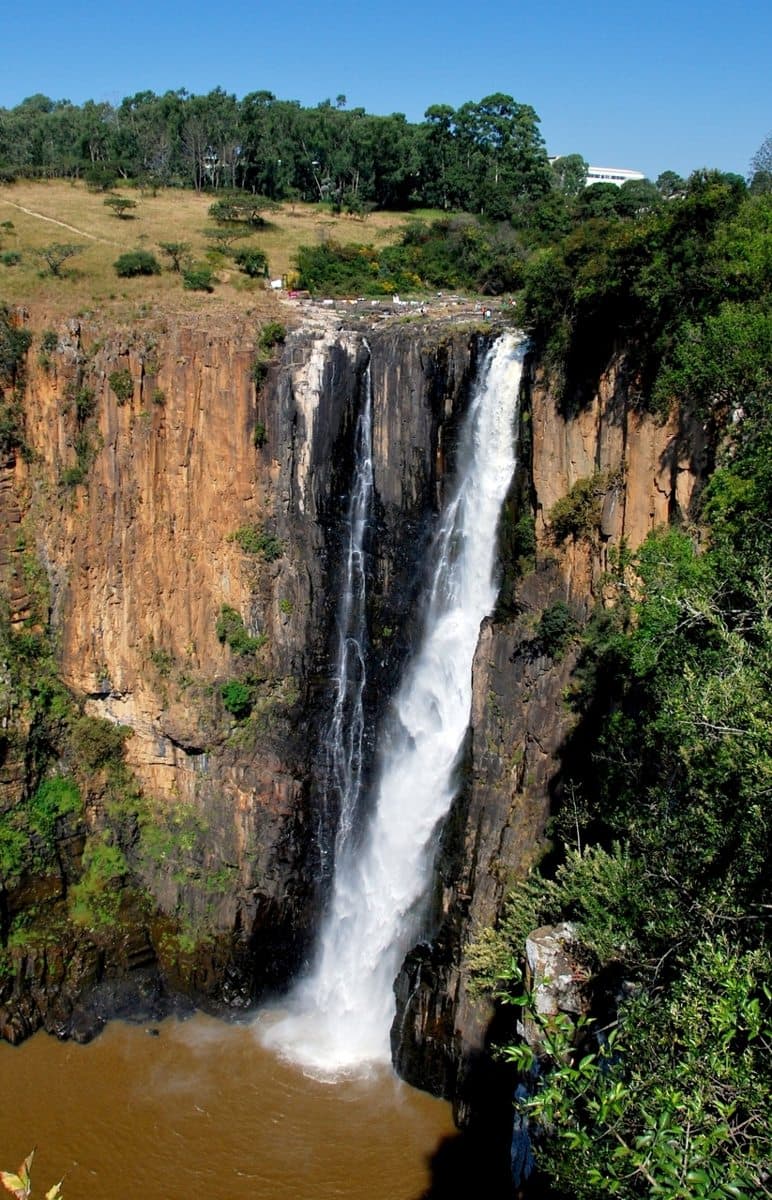 The Howick Falls is a large waterfall that occurs when the Umgeni River falls 95 metres (311 feet) over dolerite cliffs on its way to the Indian Ocean. The waterfall was known as k
