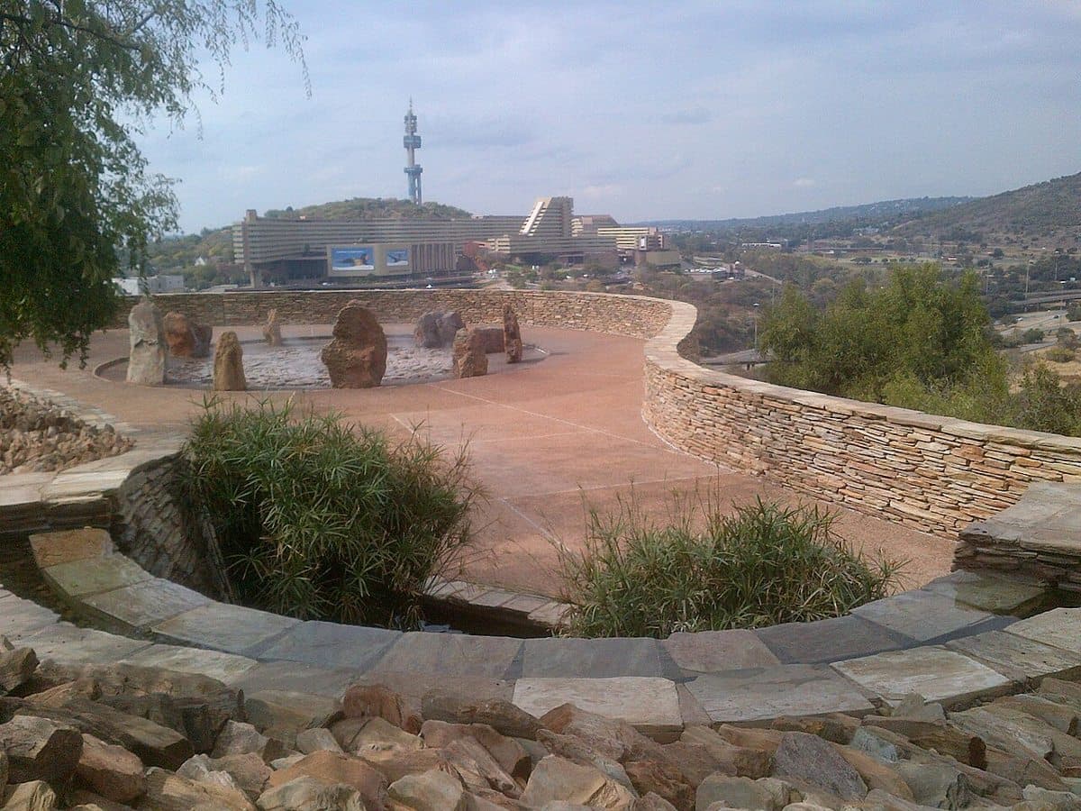 "Holy ground" (no shoes or hats allowed) at Freedom Park Pretoria with UNISA in the background.
